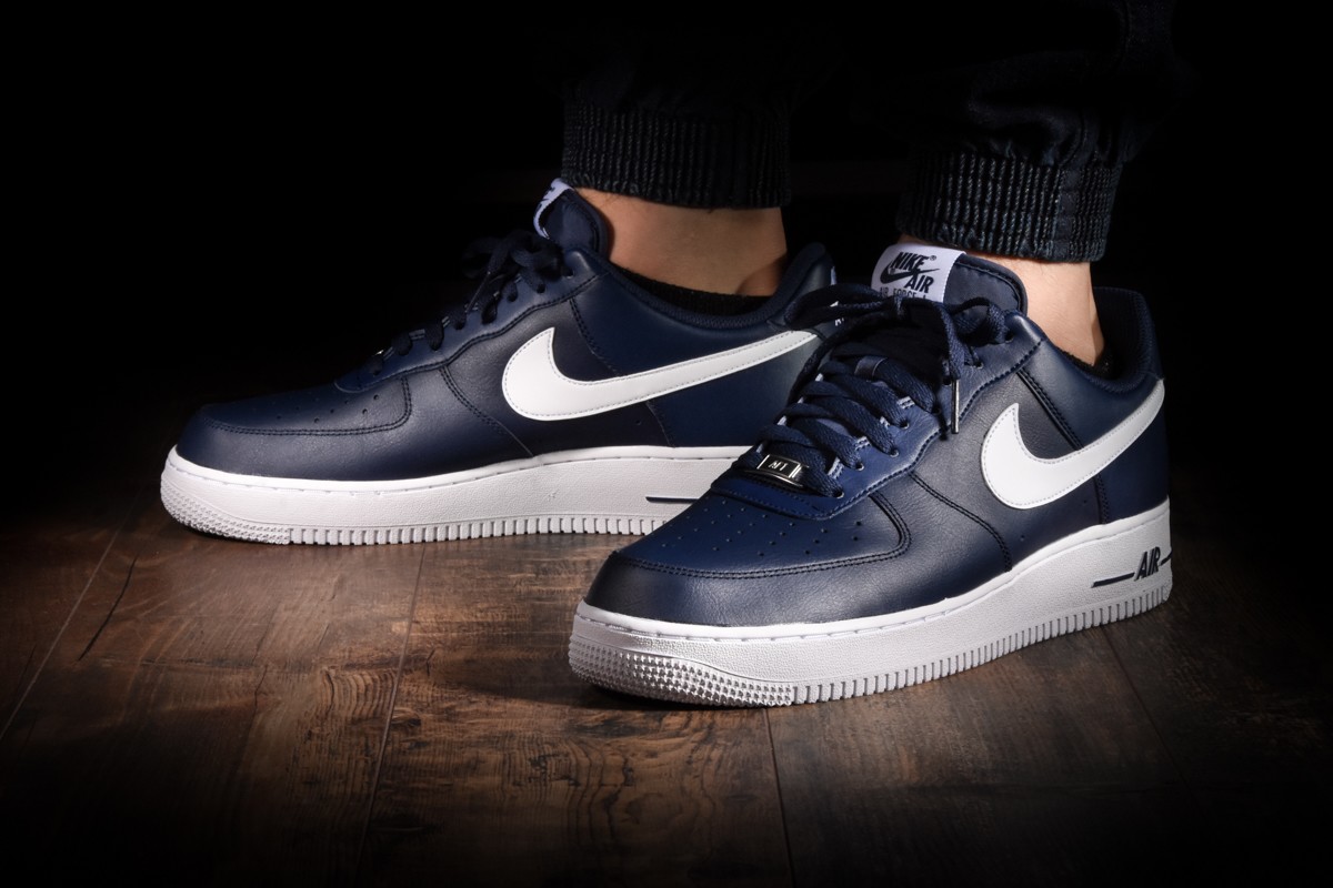 navy blue low top air force ones
